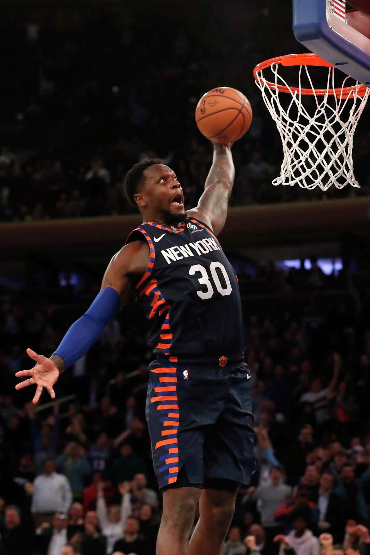New York Knicks forward Julius Randle makes a slam dunk after the buzzer against the Orlando Magic during the second half of an NBA basketball game, Thursday, Feb. 6, 2020, in New York. (AP Photo/Michael Owens)
