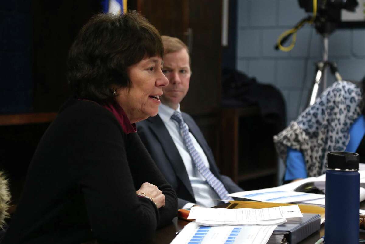 Superintendent of Schools Kevin Smith listens to Board of Education Chair Deborah Low share a comment at a meeting on Feb. 6.