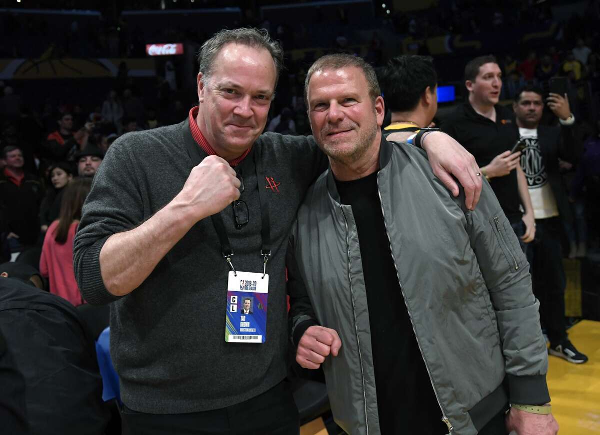 Tad Brown (L), Chief Executive Officer of the Houston Rockets, and Tilman Fertitta, owner of the Houston Rockets and chairman, Chief Executive Officer and sole owner of Landry's, Inc., one of the largest restaurant corporations, celebrate the Rockets win over Los Angeles Lakers at Staples Center on February 6, 2020 in Los Angeles, California.
