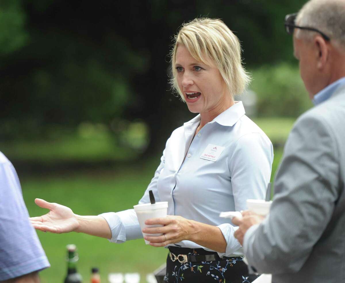 Sue Hatfield, then the Republican attorney general candidate, chats at the 87th annual Cos Cob Republican Clambake at Greenwich Point Park in Old Greenwich in 2018.