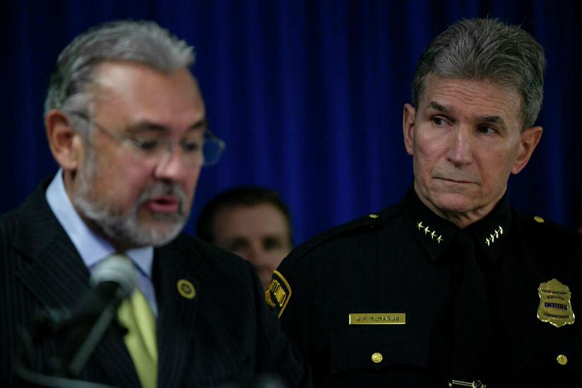 Police Chief William McManus listens to District Attorney Joe Gonzales speak on Feb. 7, 2020, during a news conference about violent crime in San Antonio. There have been 71 homicides in San Antonio from January through June this year, putting the city on track to have one of its deadliest years in three decades, an Express-News analysis of crime data shows.