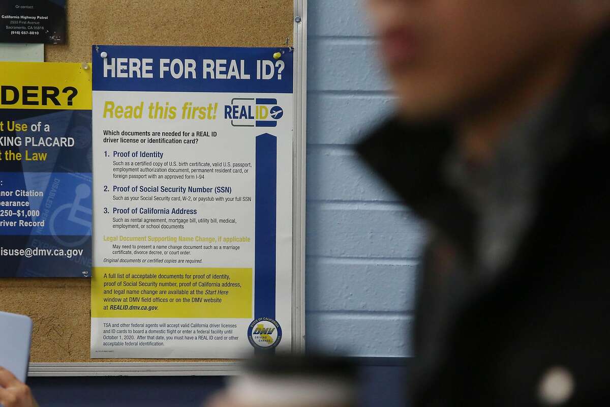 A poster for the Real ID is seen on a cork board with other notices at the DMV on Fell Street on Friday, January 24, 2020 in San Francisco, Calif.