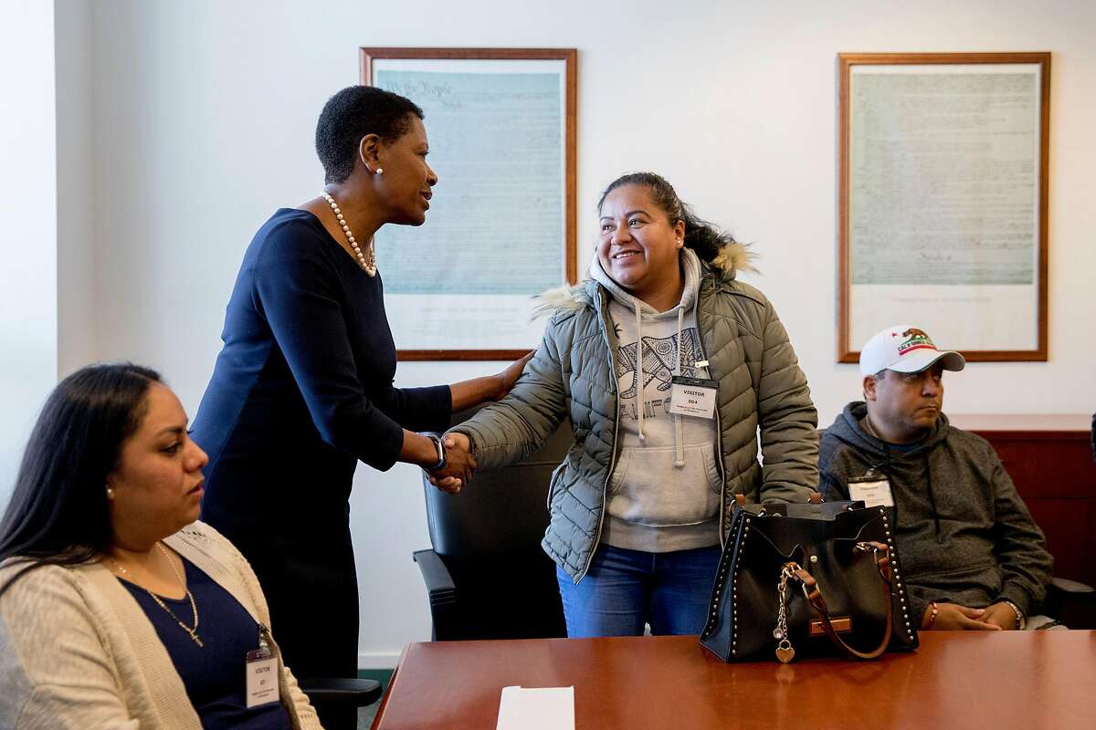Contra Costa County District Attorney Diana Becton shakes hands with Ana Arenal Ortega after hearing her story of struggle after falling victim to a rental scam while at the Richmond District Attorney's office in Richmond, Calif. Friday, January 31, 2020. Mercedes Gonzales, 25, of San Pablo, was indicted on 42 criminal counts in a real estate fraud case that stretched over three counties. Following a report from Chronicle columnist Otis Taylor on Gonzales' scheme and victim Martha Ochoa. Readers responded with donations, including a philanthropist who sent a check for $5,000. After 22 more victims were identified by the district attorney's office, the philanthropist compensated them as well.