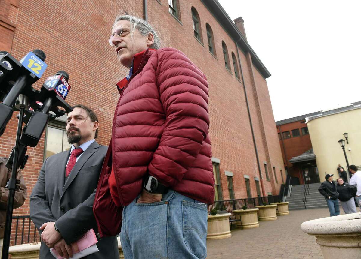 Attorneys Kevin Smith (left) and Norm Pattis speak to the press outside of the Derby Superior Courthouse in Derby, Connecticut, on Feb. 7 after a bond hearing for Jose Morales following charges of murder and tampering with physical evidence for the homicide of Christine Holloway.