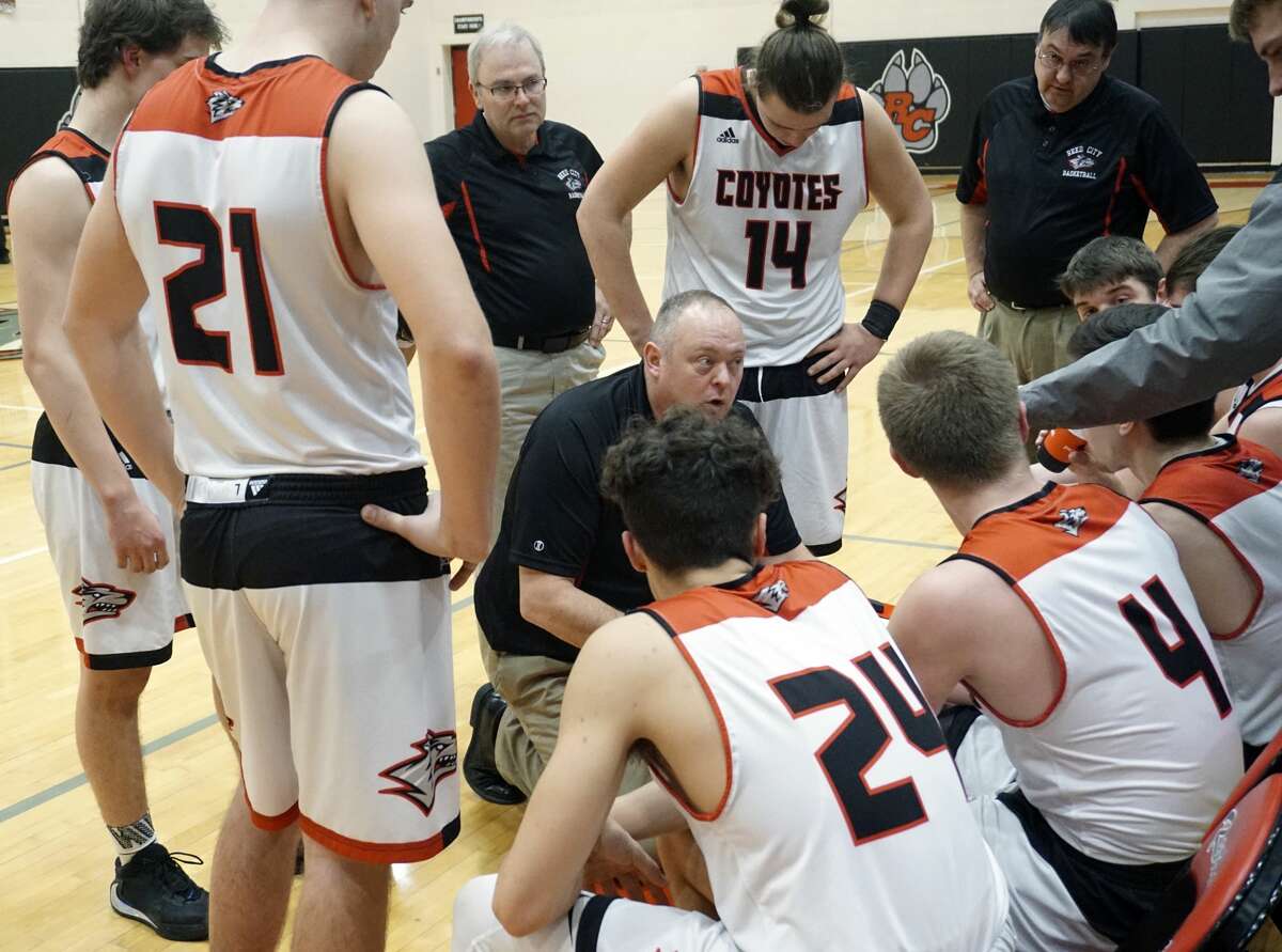 Coyotes unable to declaw Tigers: Reed City boys, girls drop home CSAA