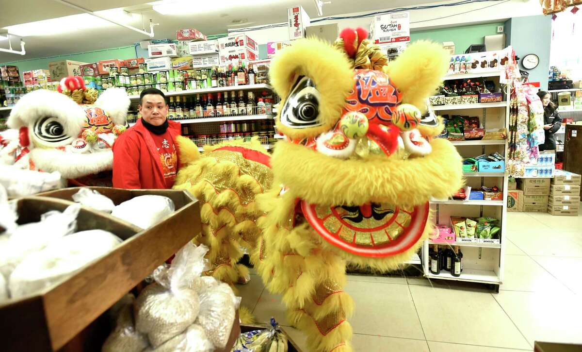 Dancing lions from the Wan Chi Ming Hung Gar Institute of New York City lead New Haven’s 9th Annual Lion and Dragon Dance Parade on February 8, 2020.