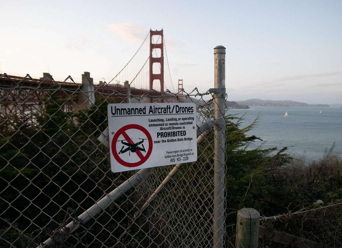 Signs around the Golden Gate Bridge notify visitors that operating drones there is illegal, but that hasn't stopped some people.