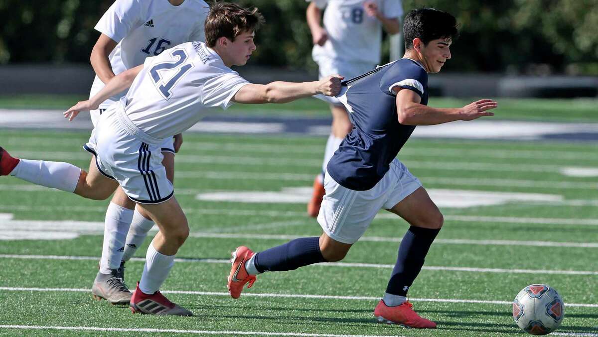 Concordia Lutheran’s Benjamin Smith, left, tries to sow down Central Catholic’s Jose Gallegos during Saturday’s TAPPS Division I second-round game. Gallegos, a North Carolina State commit, couldn’t be slowed down as he scored two goals.