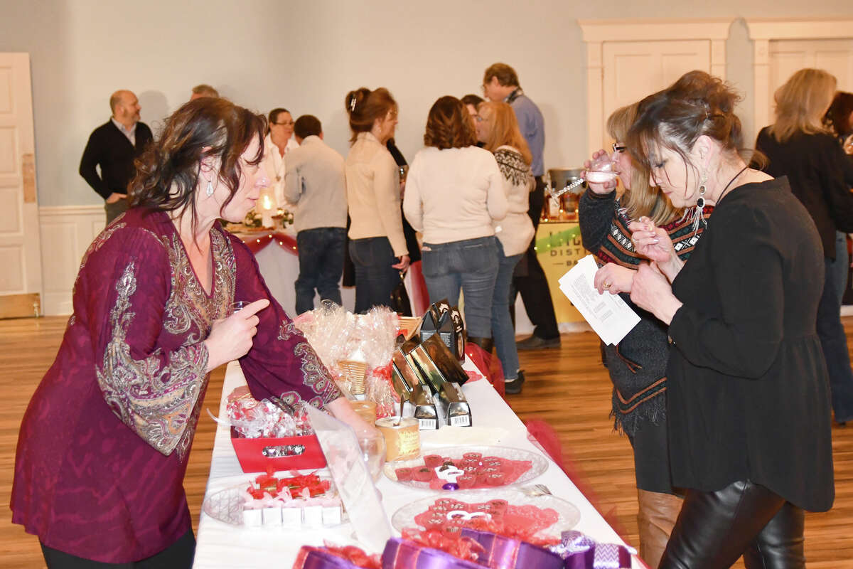 Bubbles & Truffles, a fundraiser that offers chocolate, wine and beer tastings, and other tasty treats, returns Feb. 10 after a two-year break. Pictured are guests at the 2020 event. 