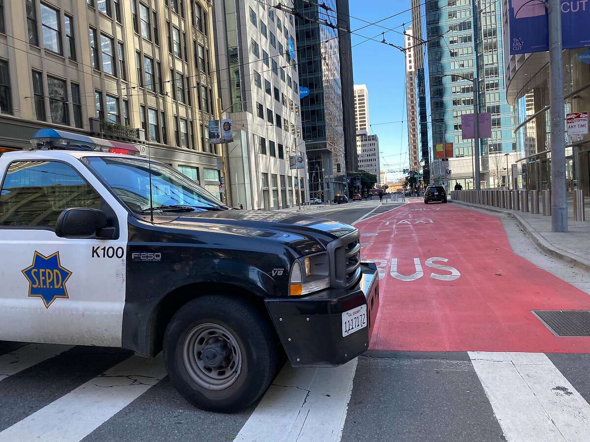 San Francisco police block off Mission Street near Salesforce Tower in response to fallen glass from the nearby Millennium Tower on Sunday, Feb. 9, 2019.