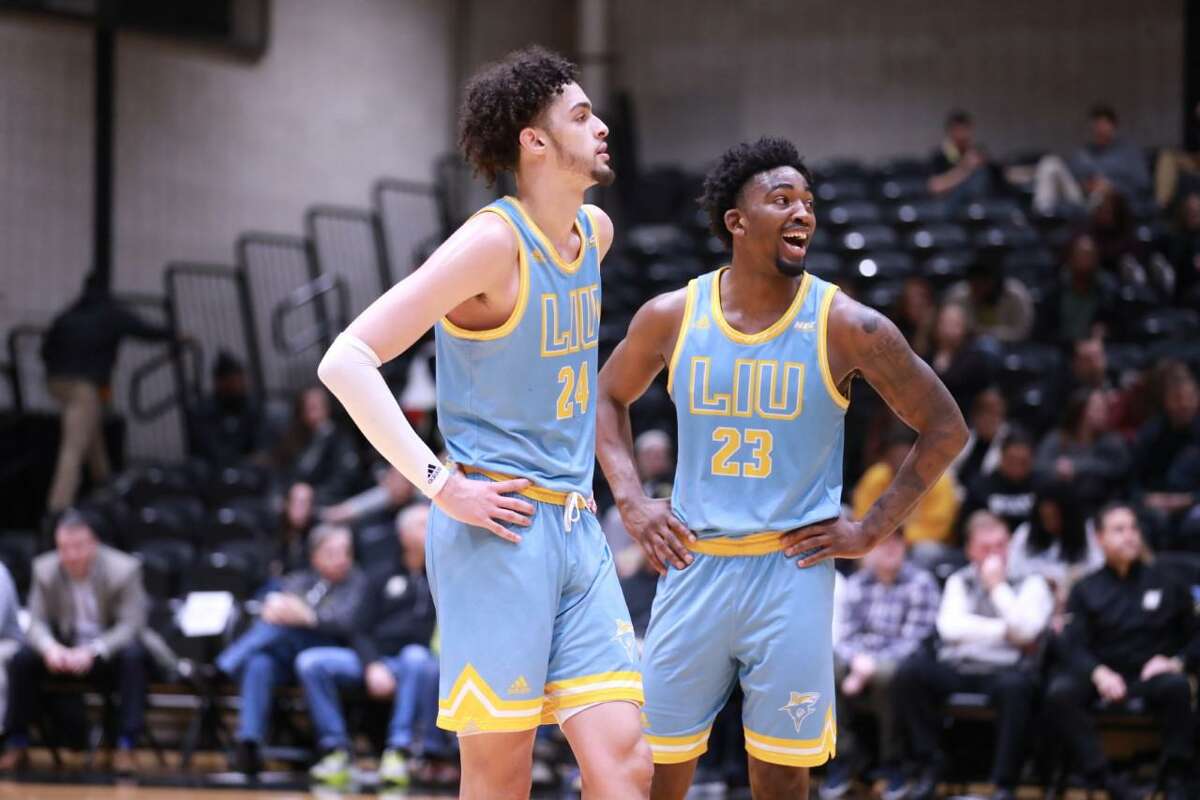 Waterbury’s Ty Flowers,left, and New Haven’s Raiquan Clark turned in historic performances for LIU on Saturday night.