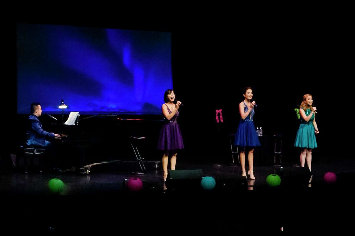 From left, Susan Egan, Laura Osnes and Christy Altomare sing a song together during a performance of the Broadway Princess Party Friday, Feb. 7, 2020 at Midland Center for the Arts. (Katy Kildee/kkildee@mdn.net)