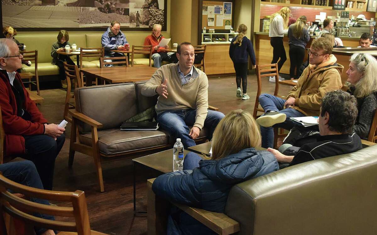 State Rep. Brian Farnen meets with residents at the Starbucks at Fairfield University Bookstore.