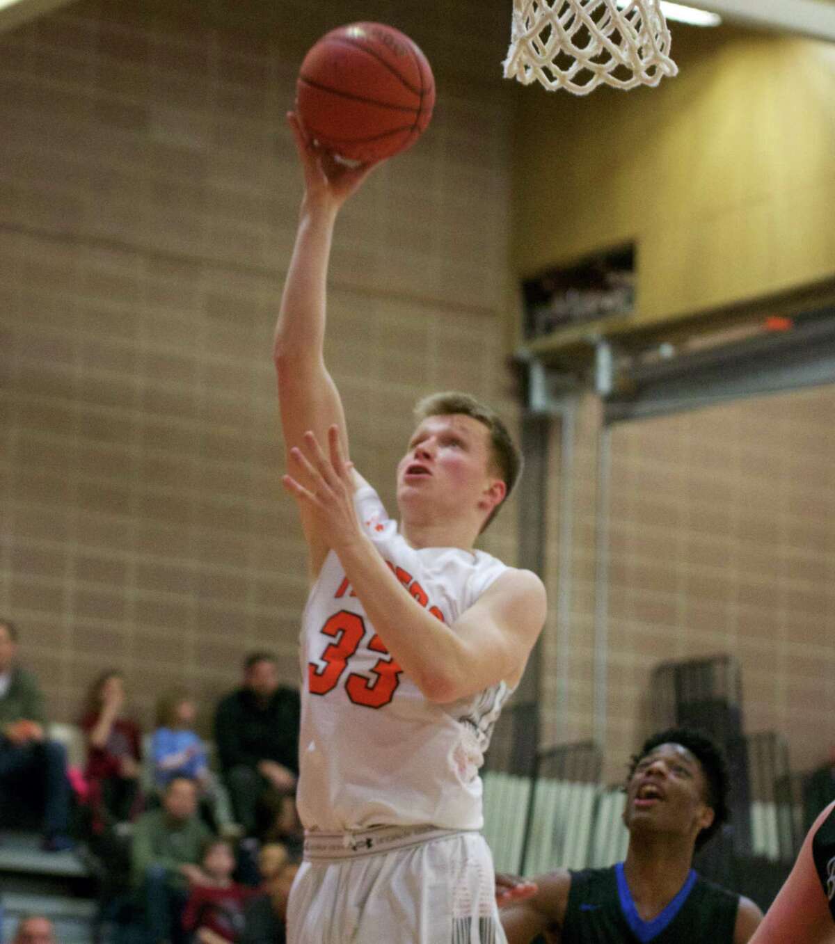 Derek Szpakowski gets open for a shot during a recent Ridgefield boys basketball game.
