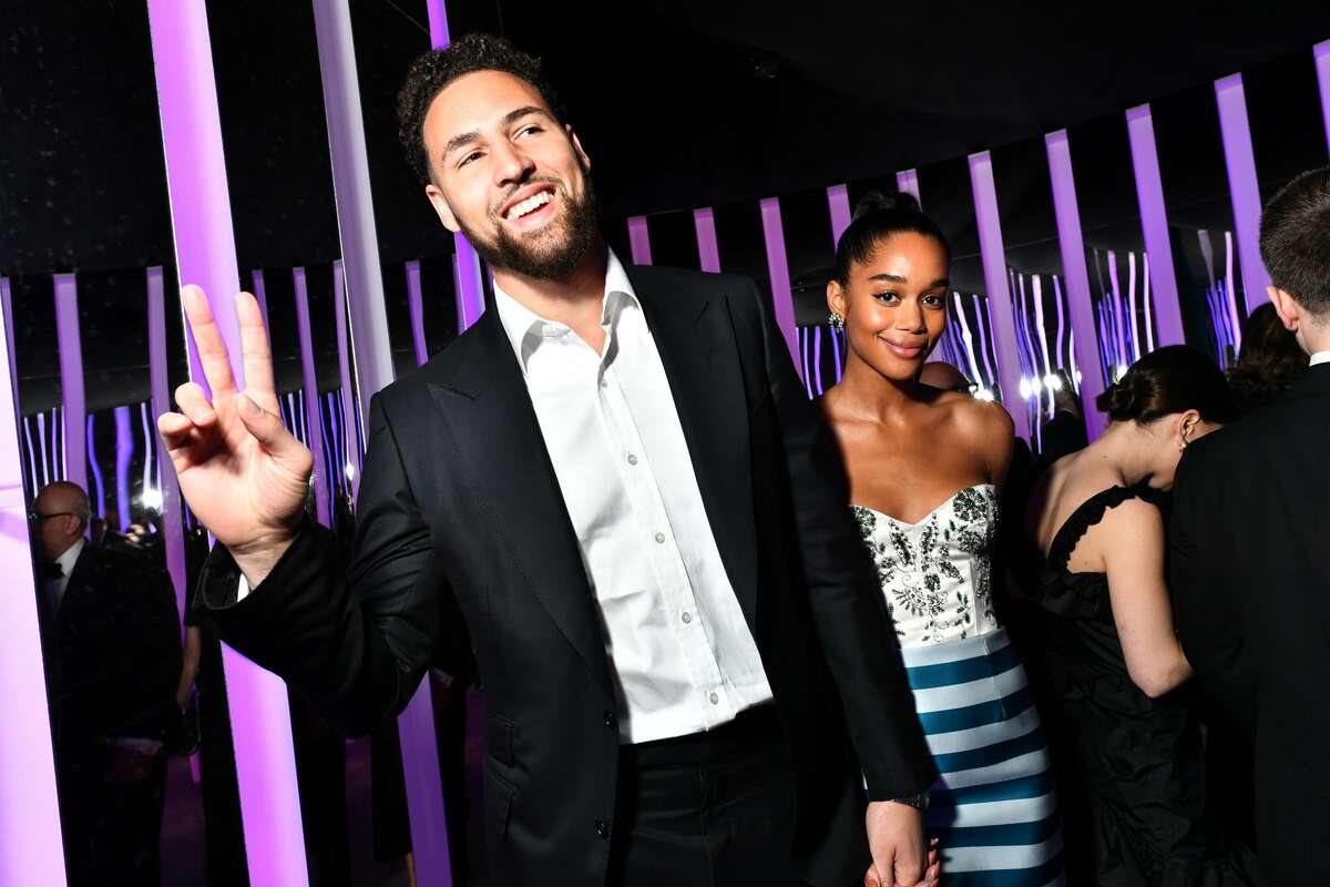 Klay Thompson and Laura Harrier attend the 2020 Vanity Fair Oscar Party hosted by Radhika Jones at Wallis Annenberg Center for the Performing Arts on February 09, 2020 in Beverly Hills, California.