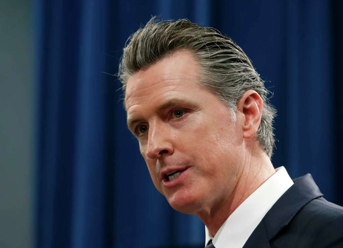 FILE - In this Jan. 10, 2020 file photo California Gov. Gavin Newsom responds to a reporters question during a news conference in Sacramento, Calif.