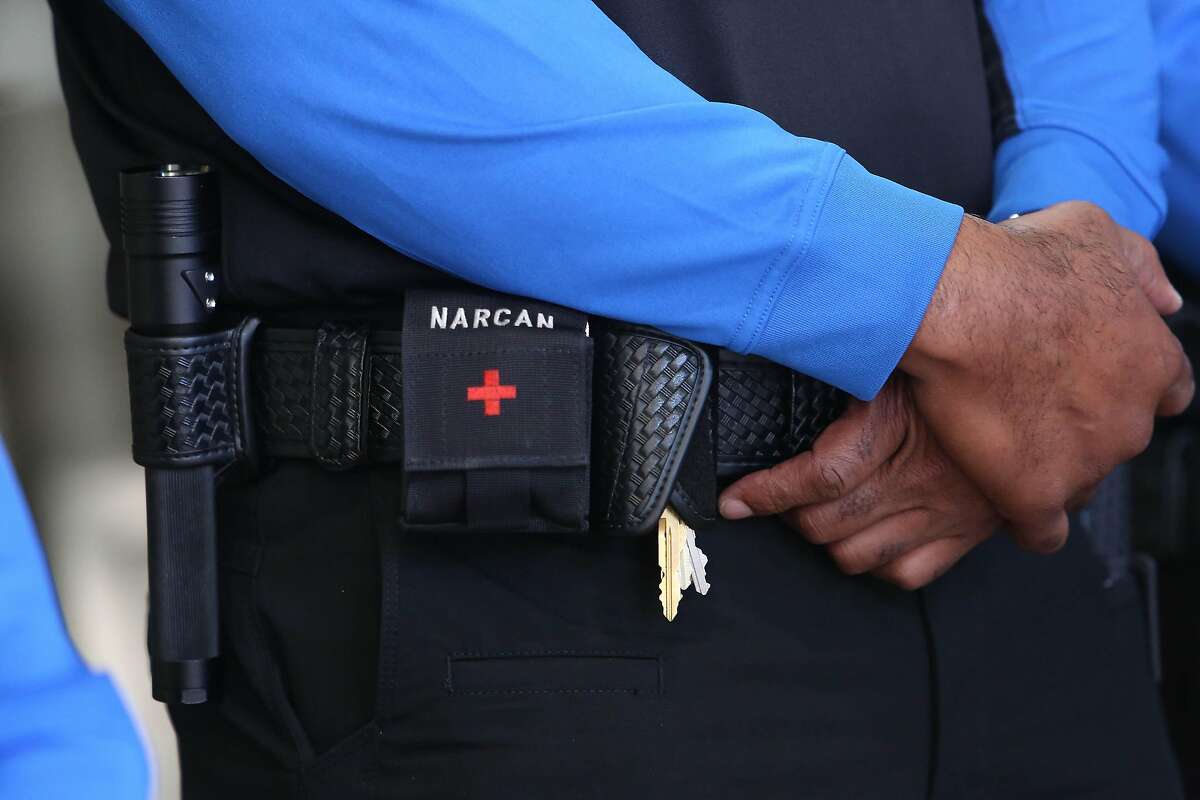 Narcan and other tools are seen on the belt of a BART ambassador at BART’s Lake Merritt Station on Monday, February 10, 2020 in Oakland, Calif.