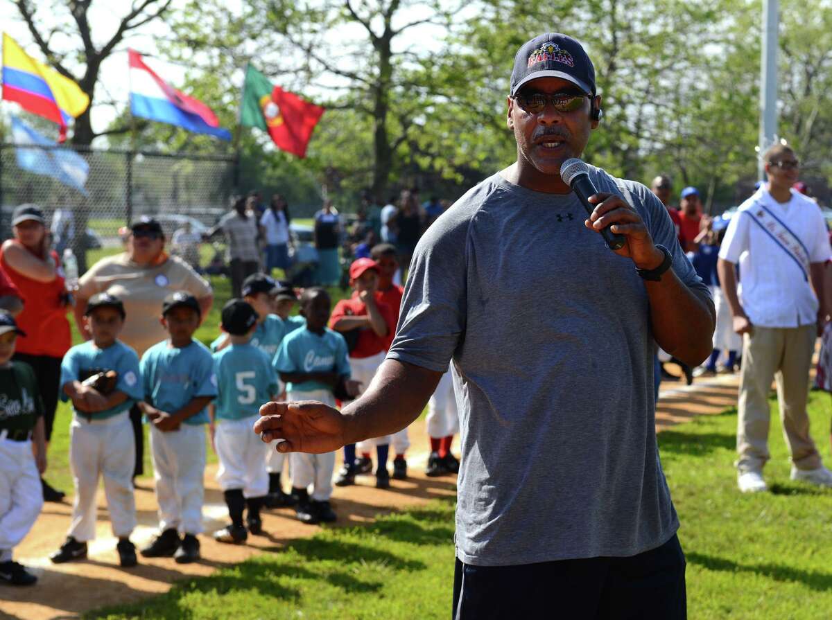 Bridgeport native and former pro baseball player Angel Echevarria speaks during the Bridgeport Caribe Youth Leaders' Caribe Day event at Seaside Park in Bridgeport,in 2013.