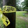Crime scene tape is wrapped around a pole at the north Vidor home were a man and woman were found murdered late Thursday night. The victims were both in their 80s and their names have not been released by police. Photo taken Friday, June 12, 2015 Guiseppe Barranco/The Enterprise