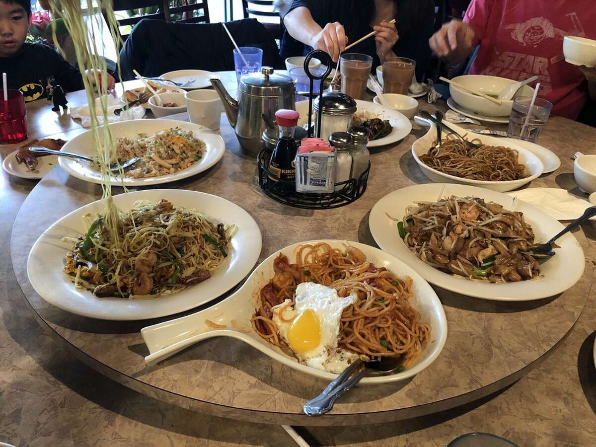Spaghetti topped with a fried egg is a signature dish at House of Bowls.