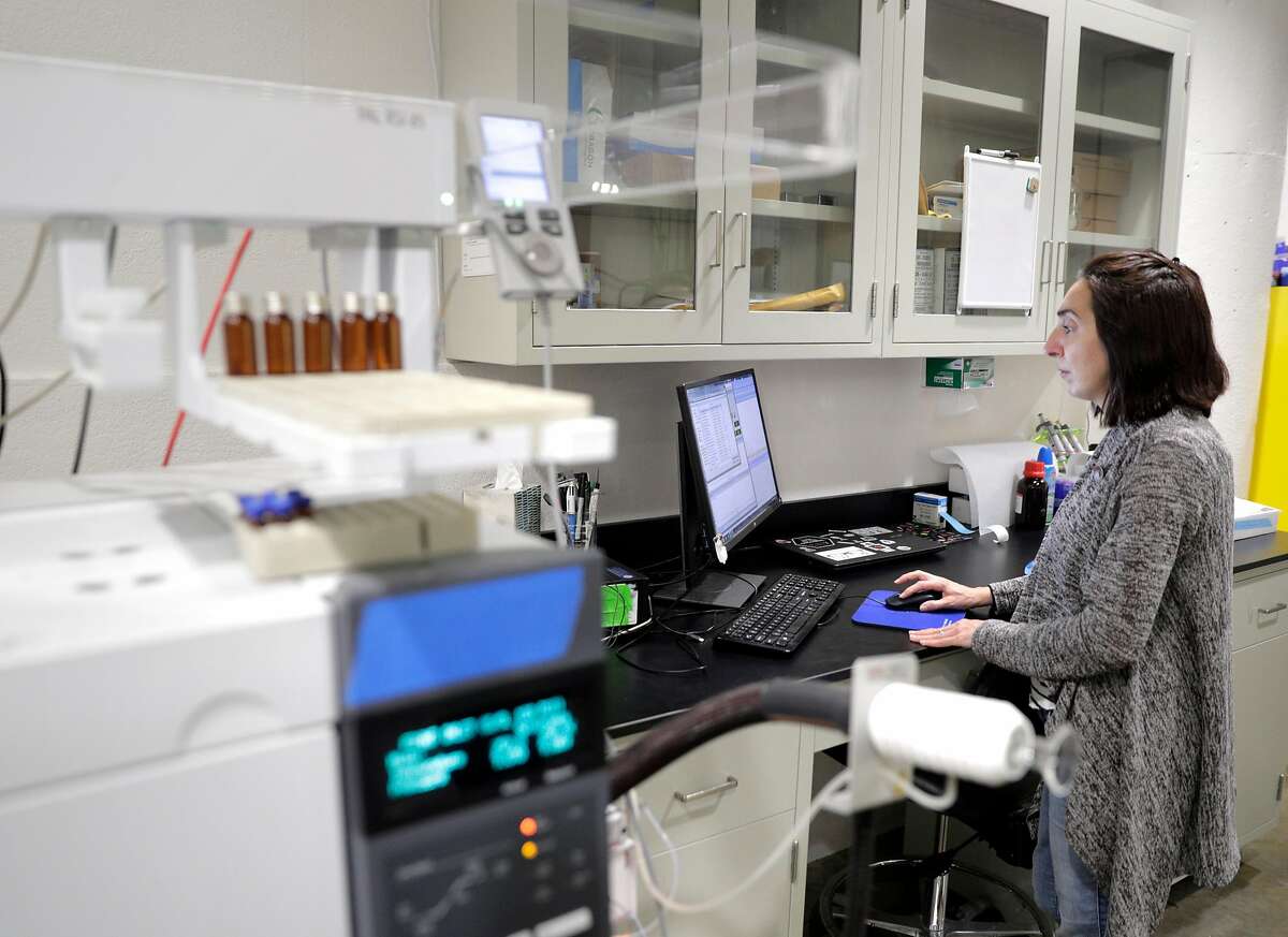 Leslie Silva, Director of Analytical Chemistry, next to a gas chromatrography mass spectrometer used for determining compounds that add flavor and smell to spirits, in the lab at the headquarters of Endless West, a startup where they are developing “molecular” wines, whiskey, and sake in San Francisco, Calif., on Monday, February 10, 2020. Endless West produces the beverages in a lab, not from plant materials. After years of development, the company is finally ready to debut the wine and sake prototypes.