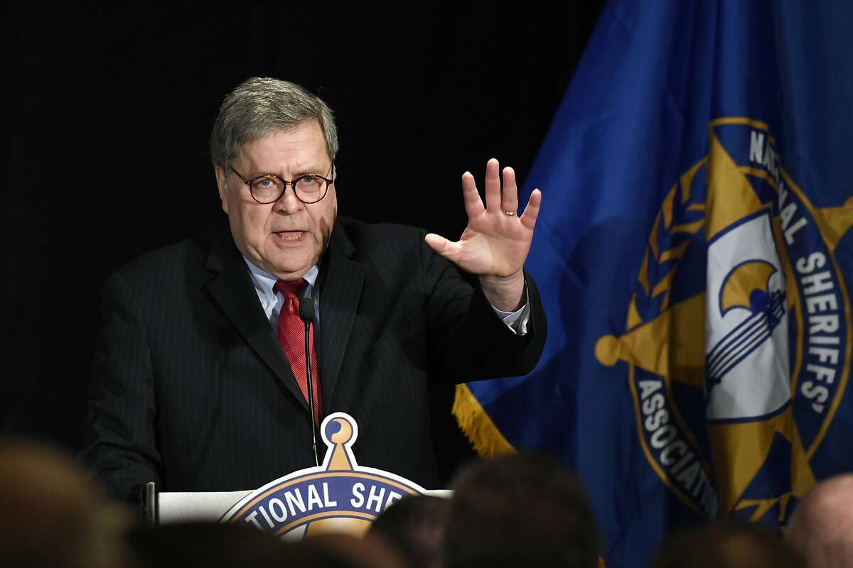 Attorney General William Barr waves as he walks on stage to speak at the National Sheriffs' Association Winter Legislative and Technology Conference in Washington, Monday, Feb. 10, 2020. (AP Photo/Susan Walsh)