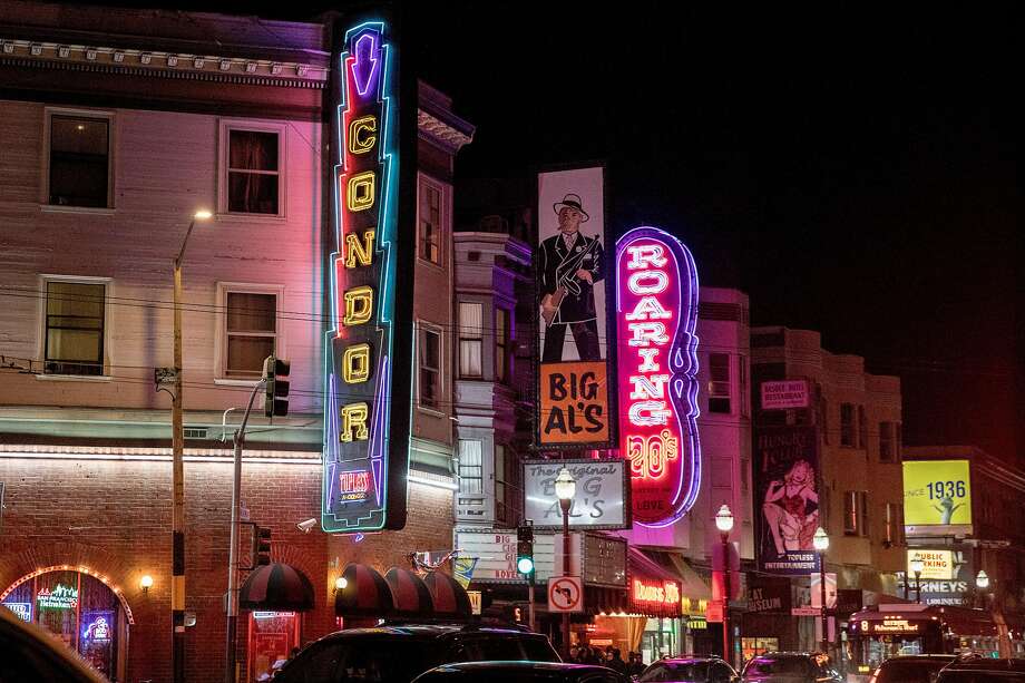 The illuminated sign of the Condor Club is seen on the corner of Broadway and Columbus Avenue the North Beach neighborhood of San Francisco, Calif. Saturday, February 8, 2020. Photo: Jessica Christian / The Chronicle