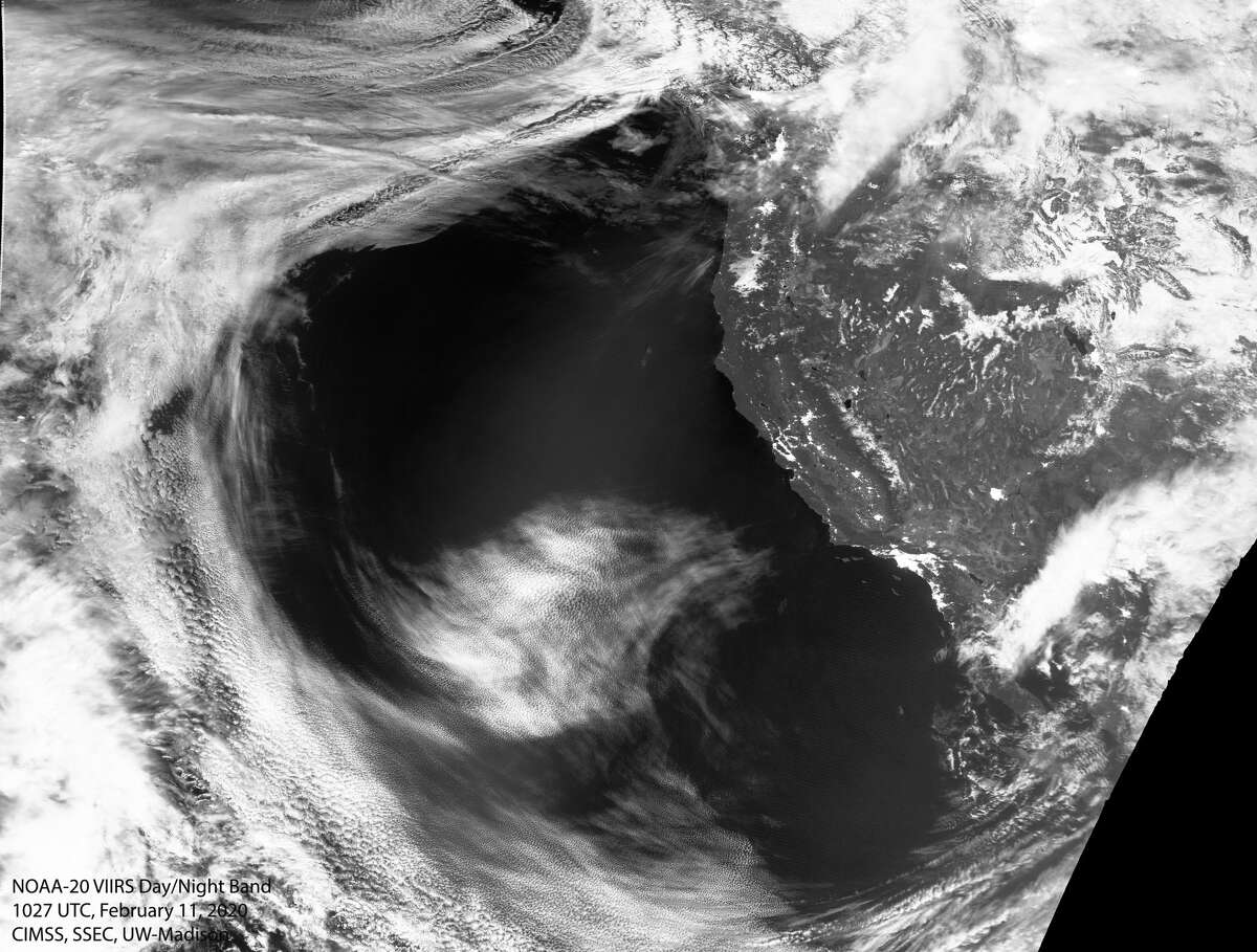 A satellite image of the West Coast from NOAA shows the high-pressure ridge blocking storms from reaching California.