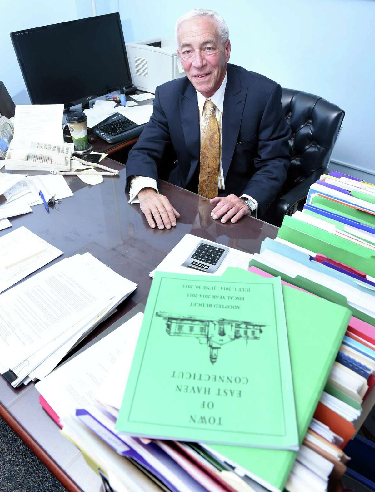 (Arnold Gold-New Haven Register) East Haven Finance Director Paul Rizza is photographed in his office at East Haven Town Hall on 12/16/2015.