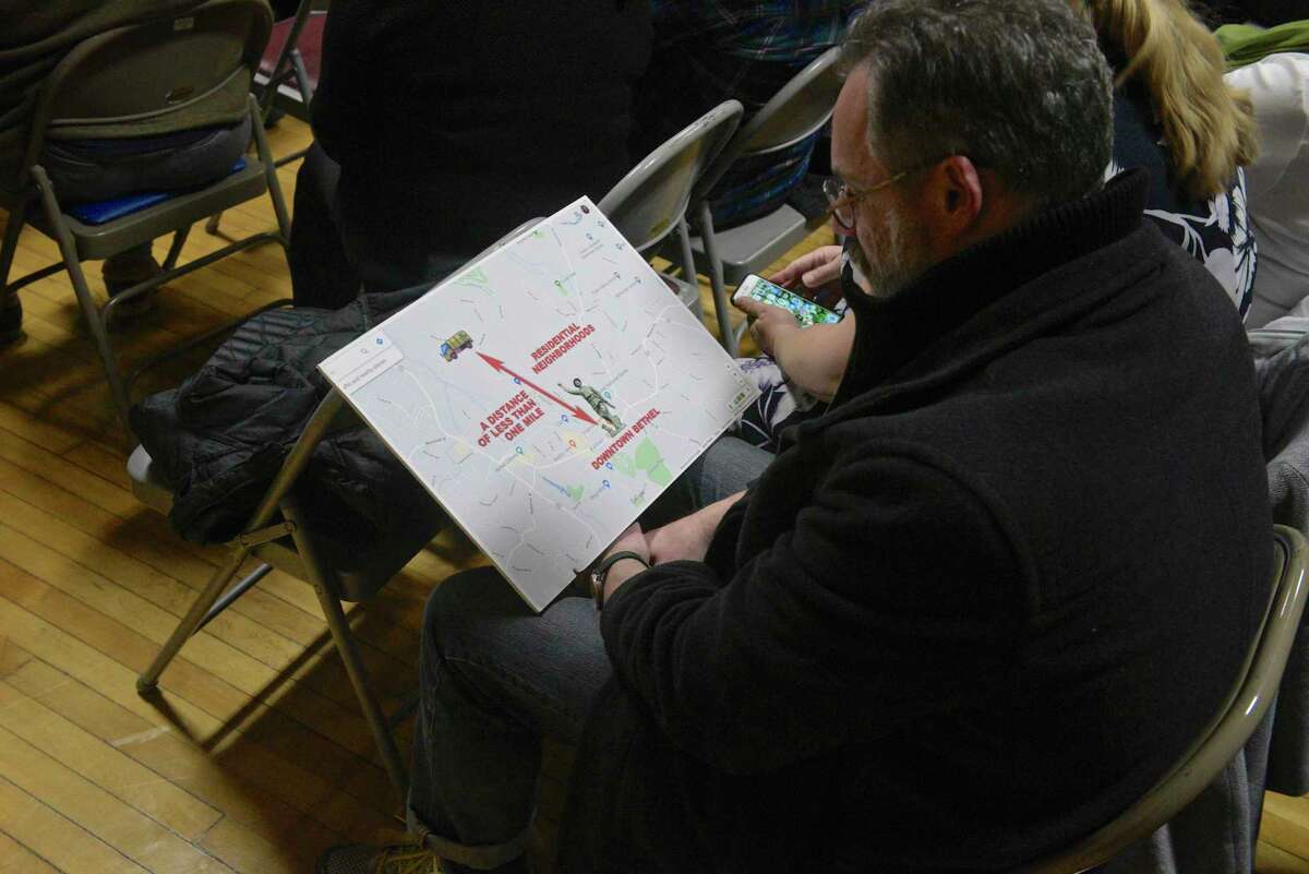 Thomas Nackid, of Bethel, attended the Planning and Zoning Commission public hearing with a sign. The hearing was on the proposed plan to expand the wood recycling facility, All Regional Recycles of Wood (ARROW) on Wooster Street. Tuesday night, February 11, 2020, in Bethel, Conn.