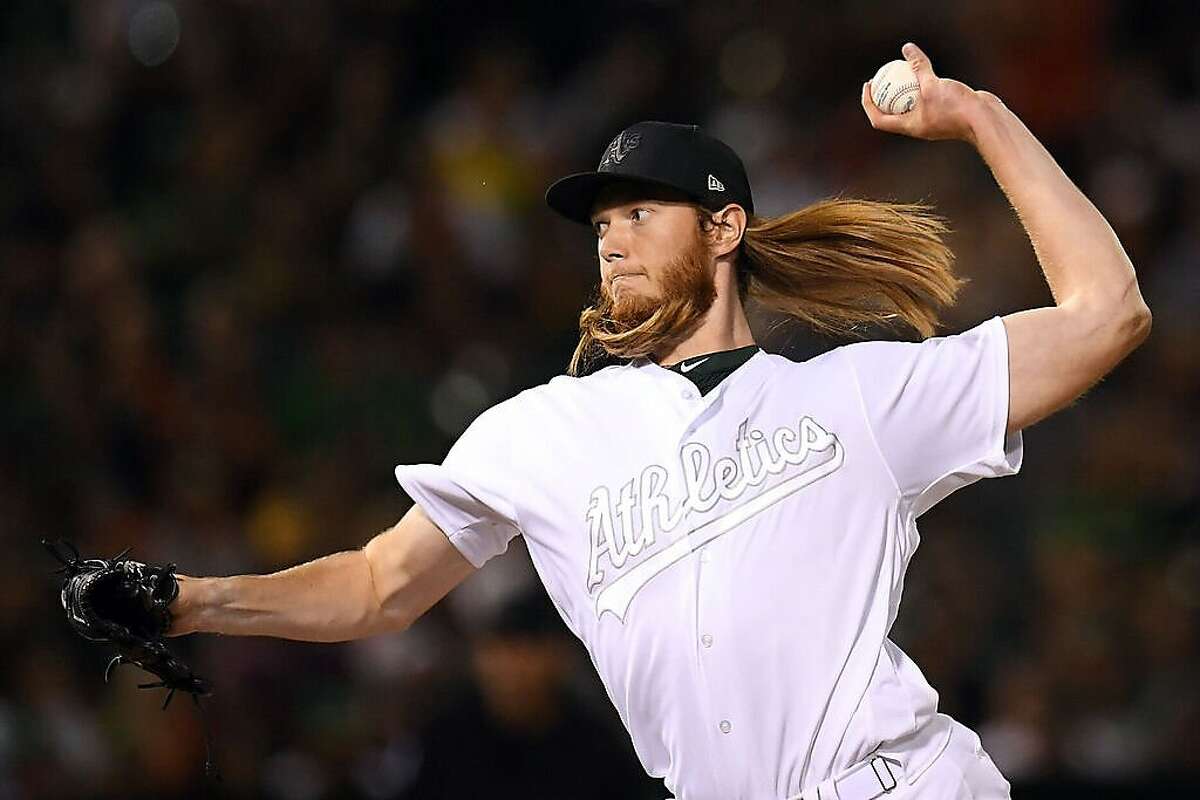 OAKLAND, CA - AUGUST 24: A.J. Puk #31 of the Oakland Athletics pitches against the San Francisco Giants at Oakland Coliseum on Saturday, August 24, 2019 in Oakland, California. (Photo by Jordan Murph/MLB Photos via Getty Images)