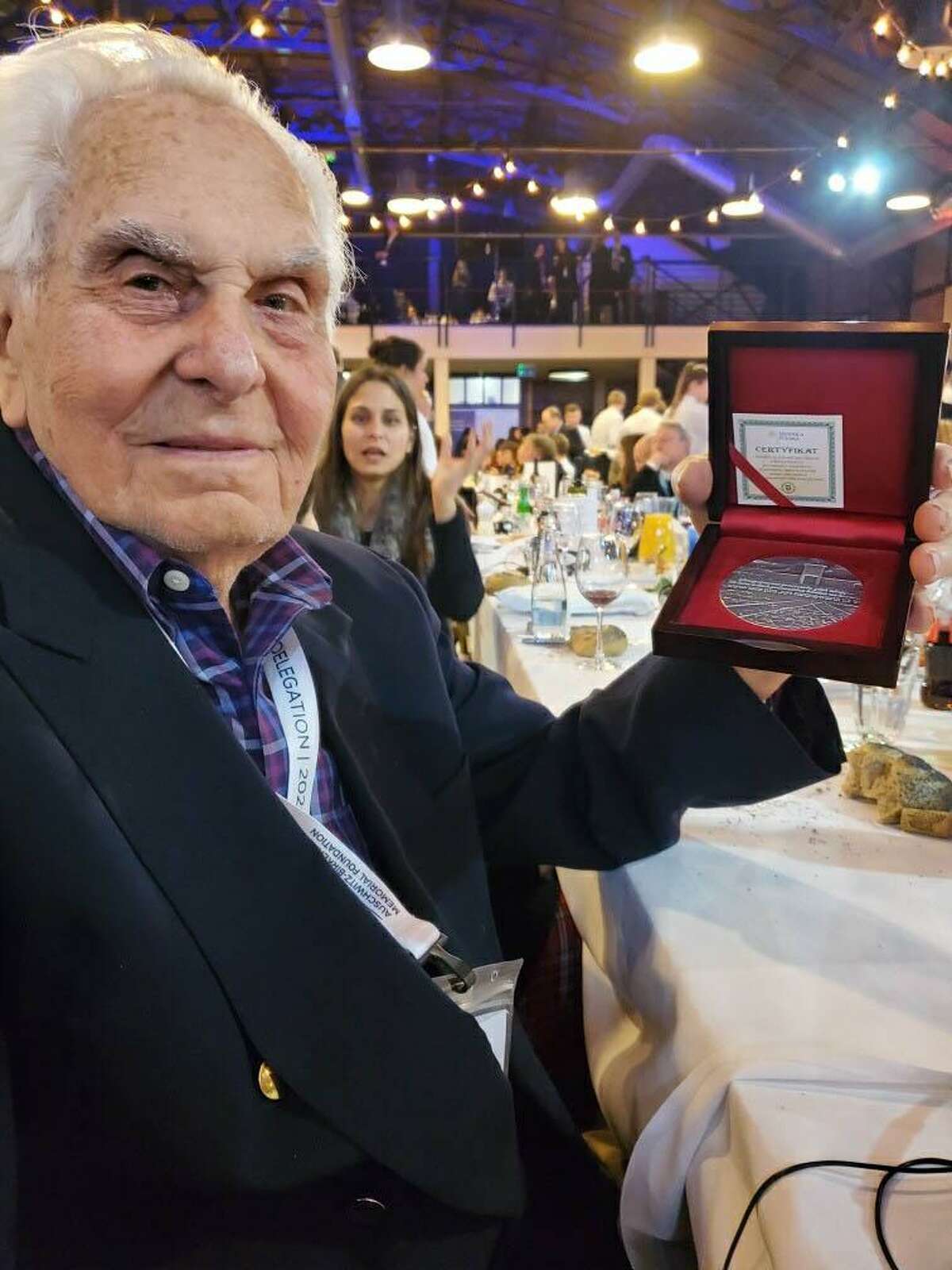 The 75th anniversary of the liberation of Auschwicz was held Jan. 27. Sherman resident David Marks, a Holocaust survivor, was among those who traveled to Poland to visit Auschwicz for the first time in 75 years. While there, he received a Certificate of Remembrance.