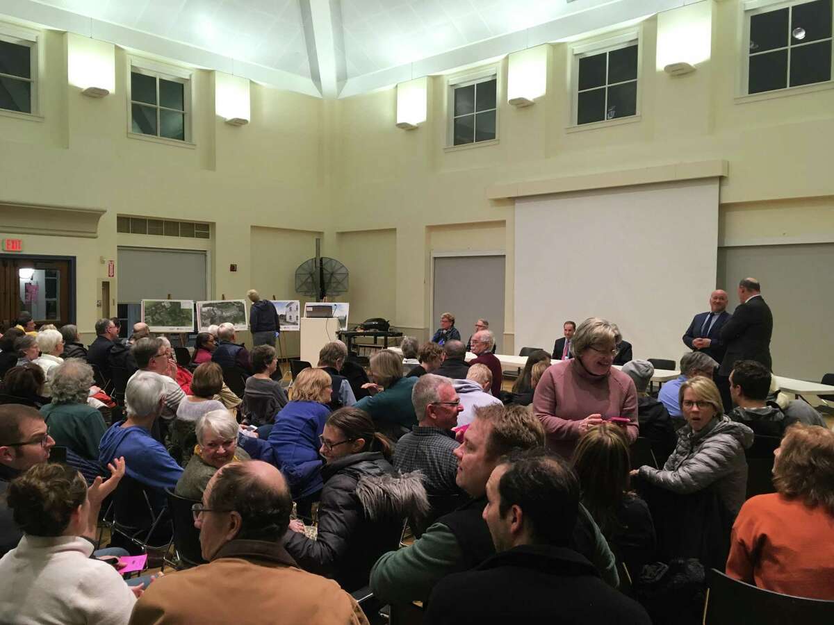 Residents of Guilford packed a room at the Nathanael B. Greene Community Center Feb. 11and voted to move forward with a plan to develop affordable housing on the Woodruff property.