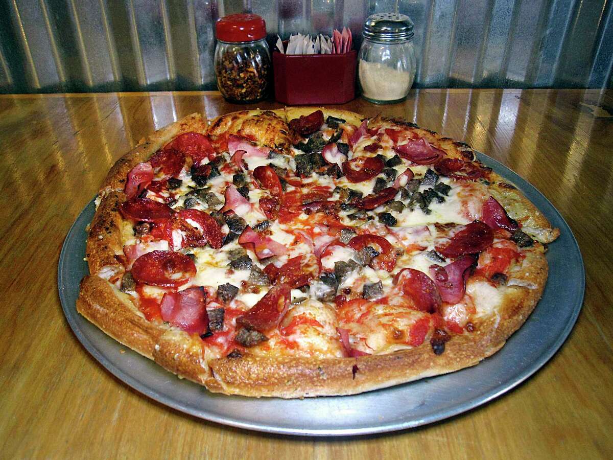 The Max Out Meat pizza includes pepperoni, ham, beef, sausage and bacon at Tank's Pizza.