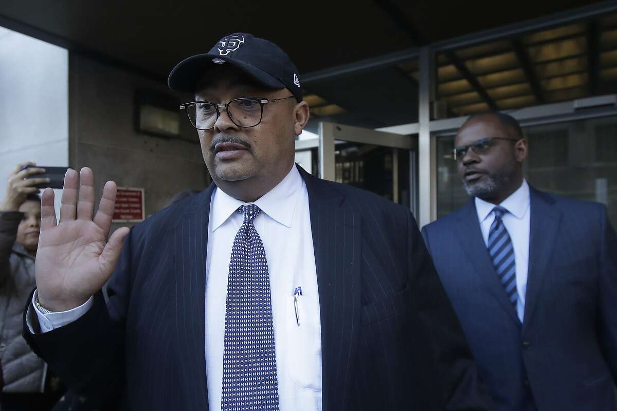 This Feb. 6, 2020, photo shows director of San Francisco Public Works Mohammed Nuru, left, leaving a federal courthouse in front of attorney Ismail Ramsey in San Francisco. On Monday, Feb. 10, 2020, Mayor London Breed announced the resignation of Nuru, who was charged with public corruption for trying to steer public contracts and taking pricey gifts. (AP Photo/Jeff Chiu)
