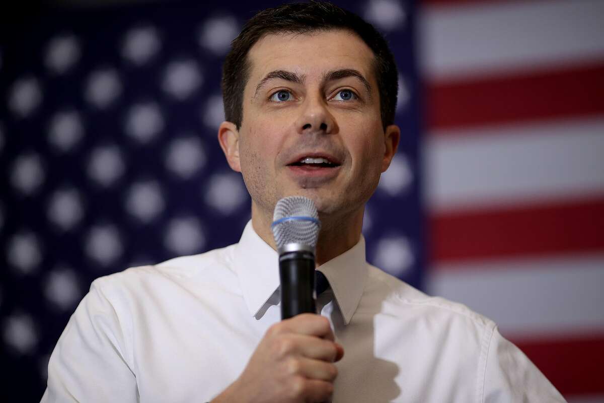 FILE PHOTO: Democratic presidential candidate former South Bend, Indiana Mayor Pete Buttigieg speaks at a Meet Pete campaign event at Plymouth State University Feb. 10, 2020 in Plymouth, N.H.
