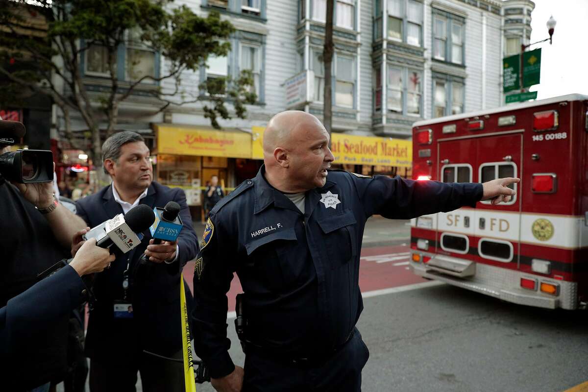 SFPD Sgt. Frank Harrell speaks to the press about the current status of a police investigation on Mission Street after a driver hit three pedestrians, left the scene and then returned to cooperate with police in San Francisco, Calif., on Wednesday, February 12, 2020.