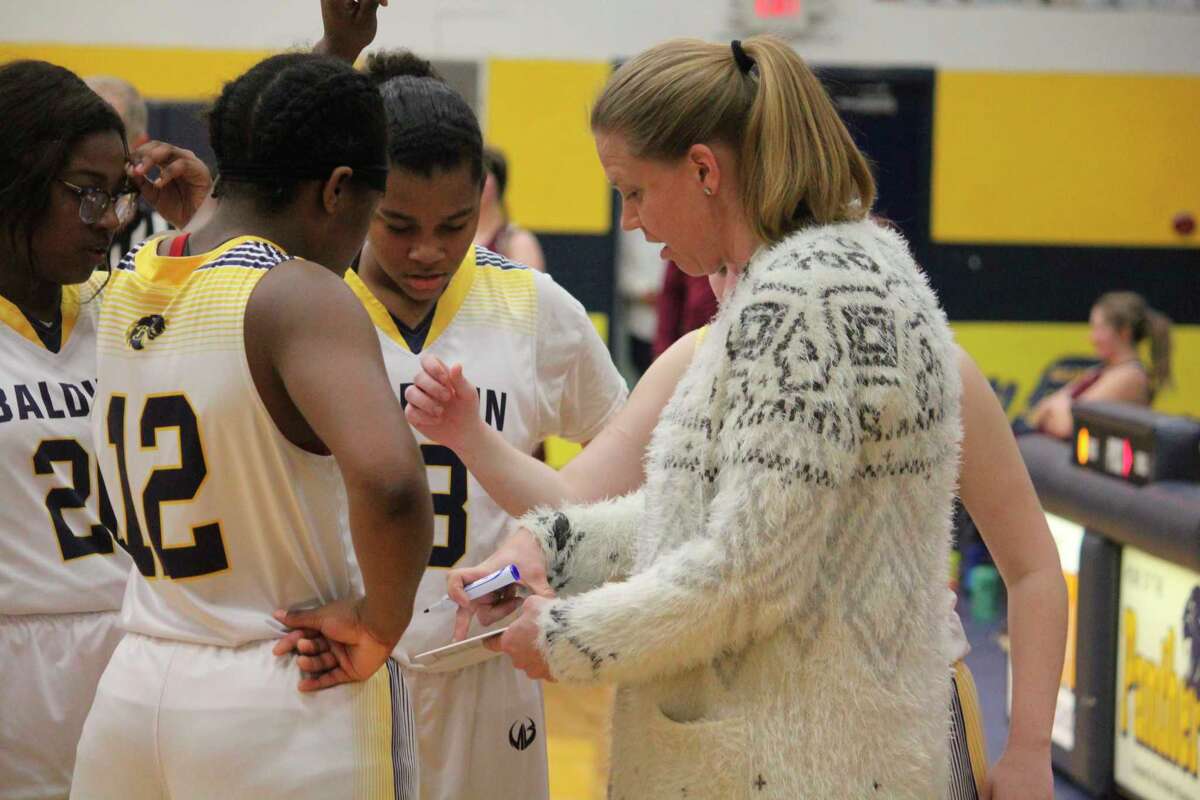 Baldwin girls basketball coach Nikki Bergman designs a play for her team. (Star photo/John Raffel)