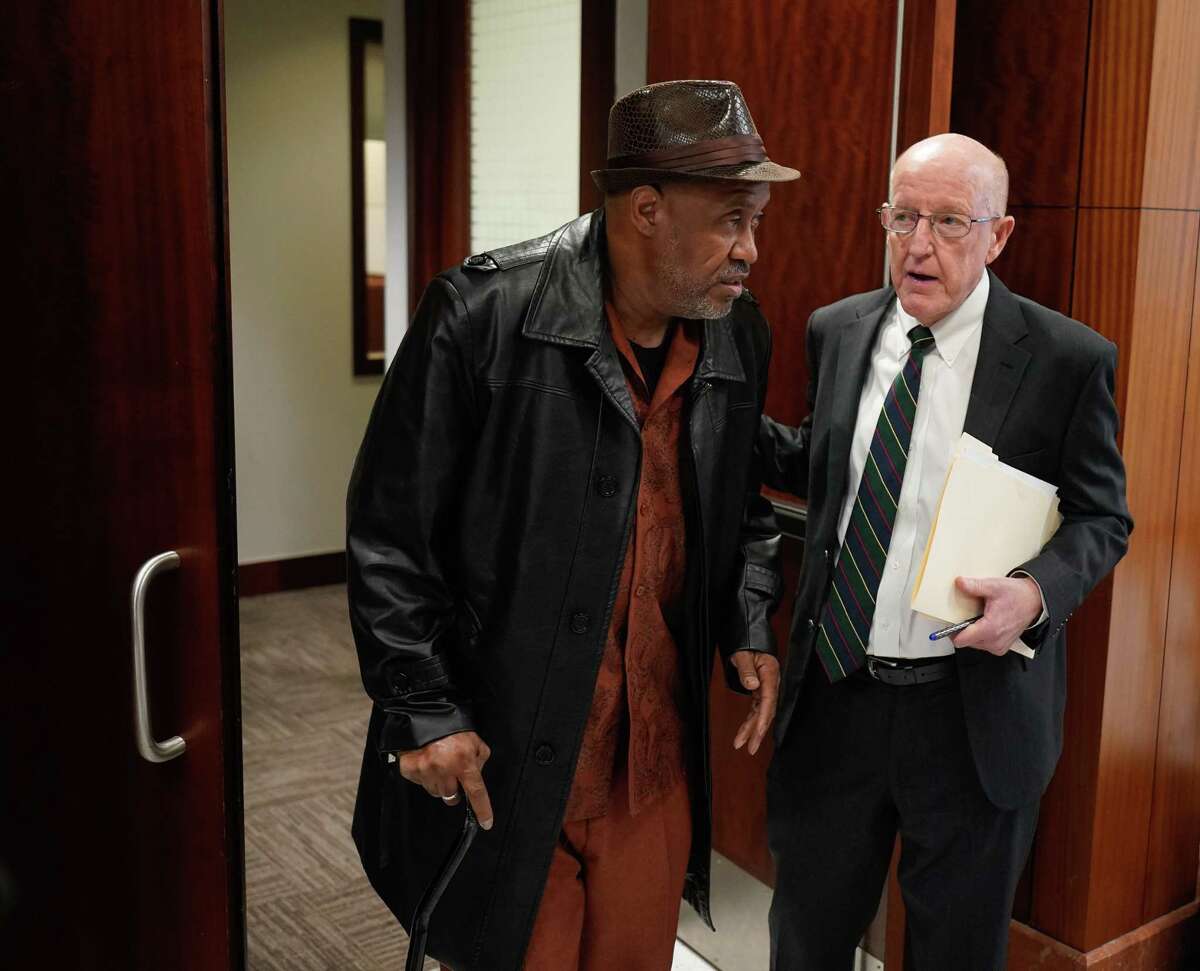 Steven Mallet, left, leaves with attorney, Robert Wicoff, from court Thursday, Feb. 13, 2020 in Houston after being declared 'actually innocent' of drug charges for which he was convicted. His conviction was based on the casework of Gerald Goines, ex narcotic officer connected to fatal Harding St. raid.