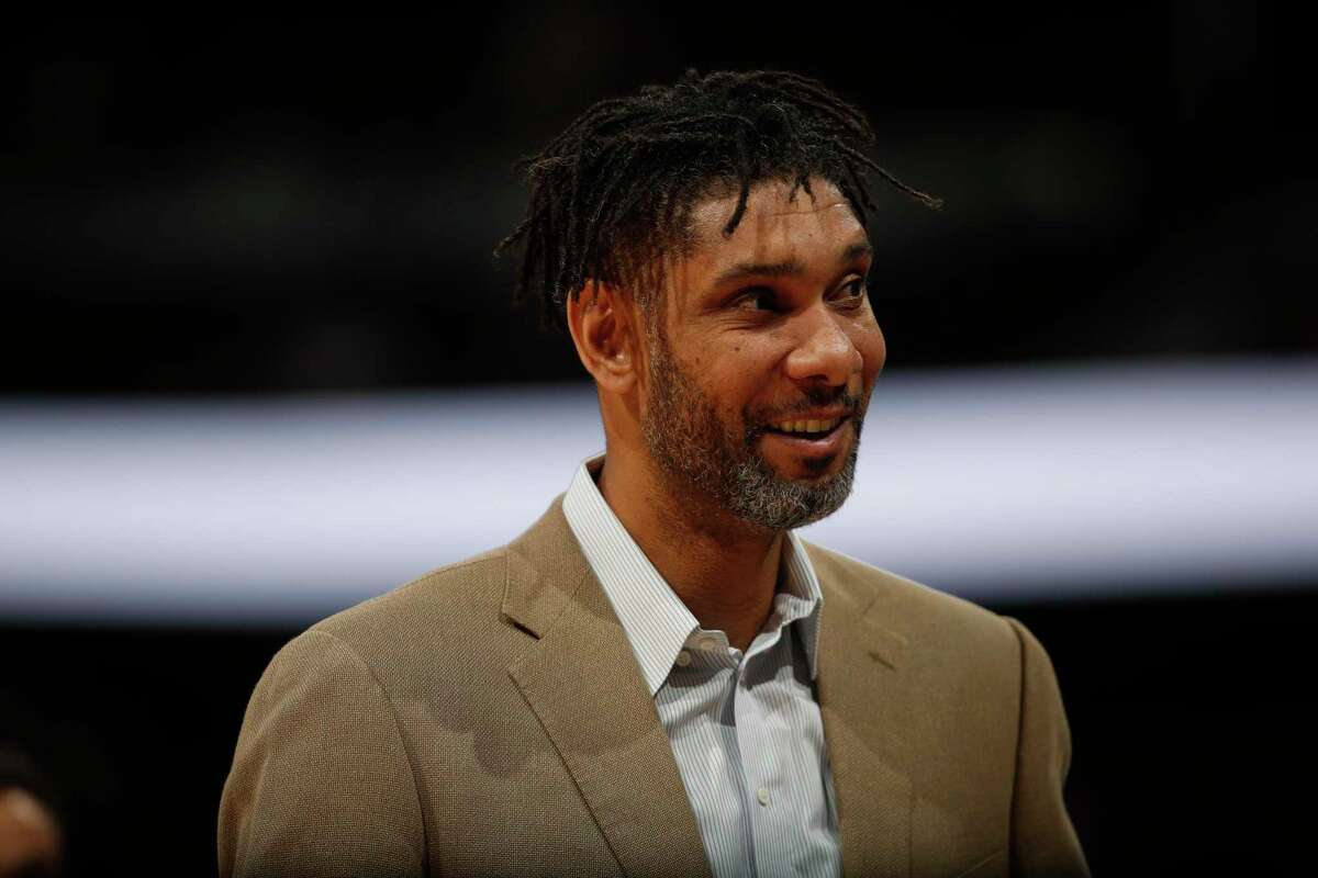San Antonio Spurs assistant coach Tim Duncan in the first half of an NBA basketball game Monday, Feb . 10, 2020, in Denver.