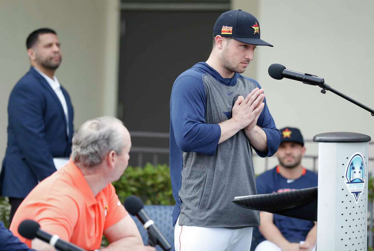 Houston Astros Alex Bregman puts his hands together as he apologized to owner Jim Crane and fans as he addressed sign-stealing scandal during a press conference before the start of the first day of the Houston Astros spring training camp at the Fitteam Ballpark of The Palm Beaches, in West Palm Beach , Thursday, Feb. 13, 2020.