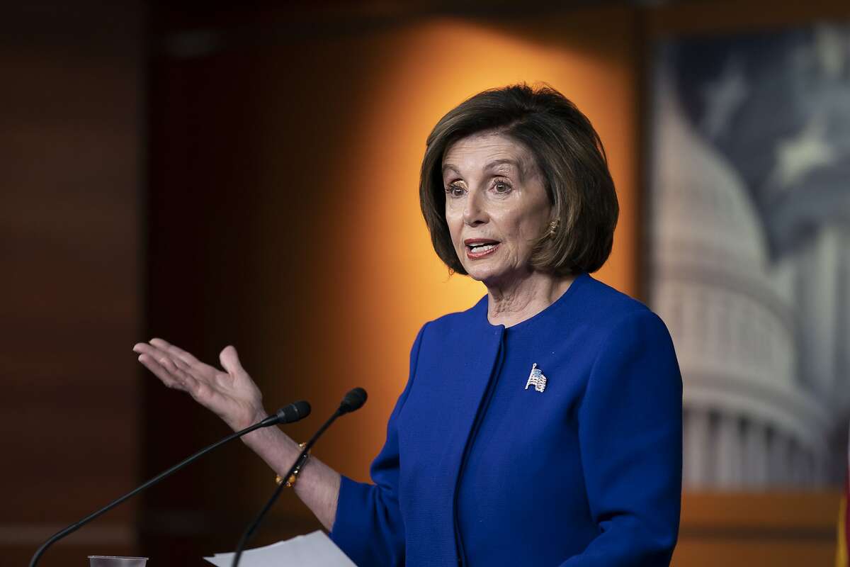 Speaker of the House Nancy Pelosi, D-Calif., talks to reporters just before the House vote to remove the deadline for ratification of the Equal Rights Amendment, on Capitol Hill in Washington, Thursday, Feb. 13, 2020. (AP Photo/J. Scott Applewhite)