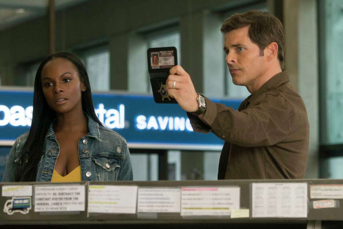 This image released by Paramount Pictures shows Tika Sumpter and James Marsden, right, in a scene from "Sonic the Hedgehog ." (Paramount Pictures/Sega of America via AP)