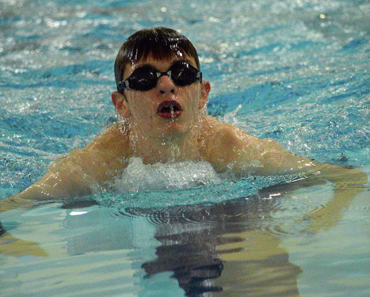 Edwardsville’s Cameron Moss swims in the 100-yard breaststroke during Thursday’s Southern Illinois High School Boys Championships at Chuck Fruit Aquatic Center.