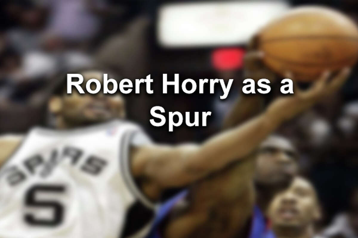 Robert Horry was a member of the Spurs' 2005 and 2007 championship teams. Click through to see the mega athlete's career in pictures.