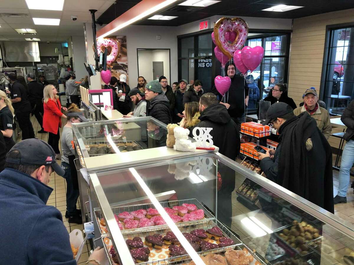 Many folks turned out for the opening of the “Next Generation” Dunkin’ in Milford Friday.