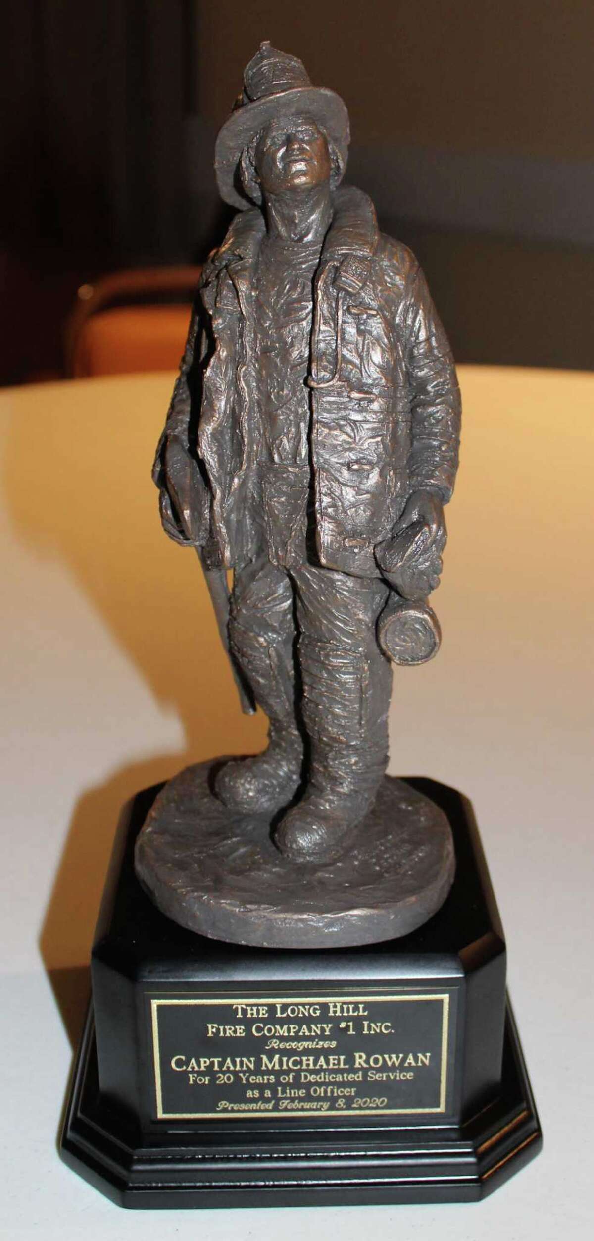 Award presented to retired Captain Mike Rowan.