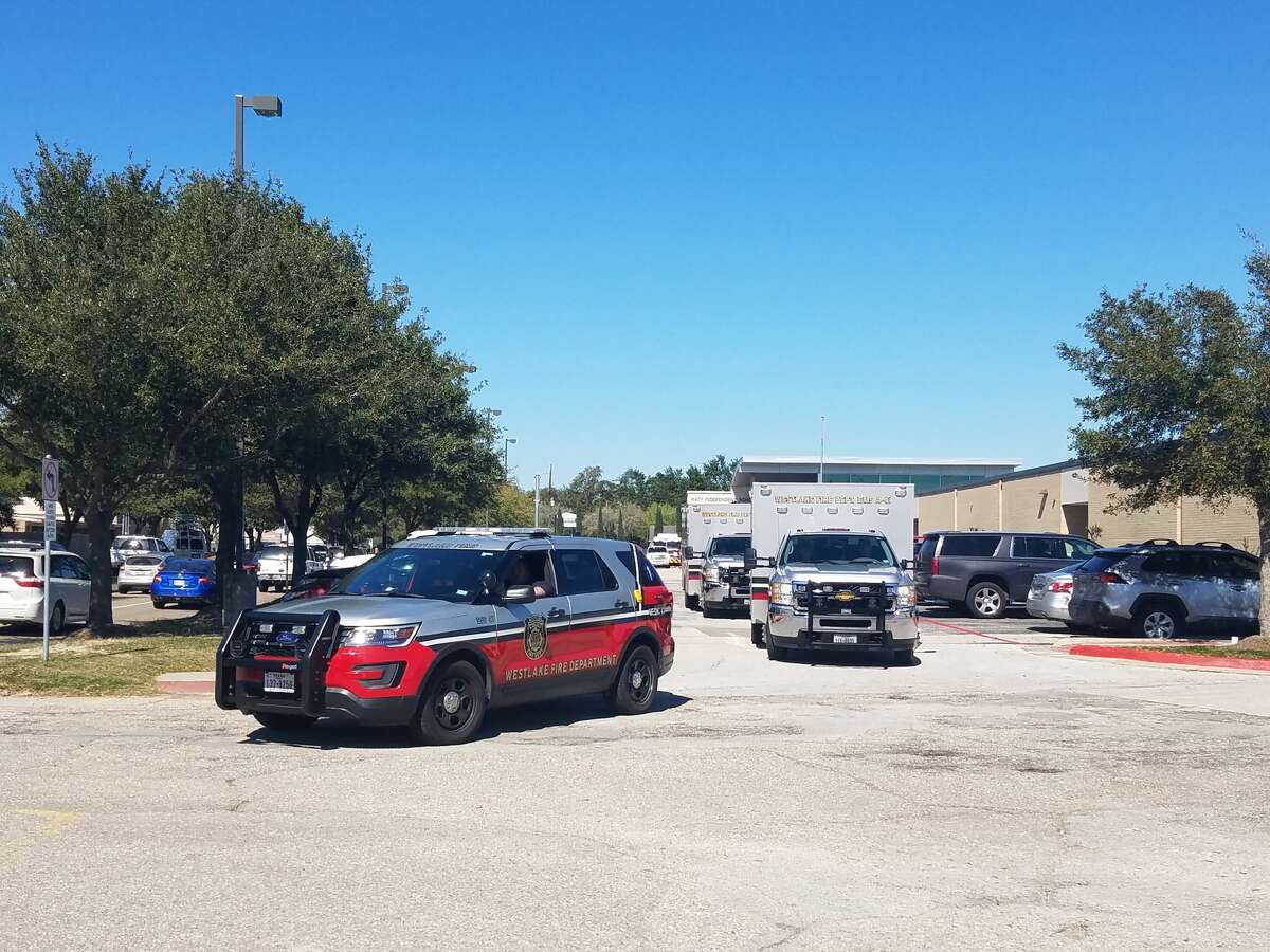 An ambulance leaves Mayde Creek Junior High School on Friday, Feb. 14, 2020, after responding to an explosion on the campus. Fire department personnel reported that a cell phone battery exploded on the campus. A total of 12 students were treated for burns and smoke inhalation.