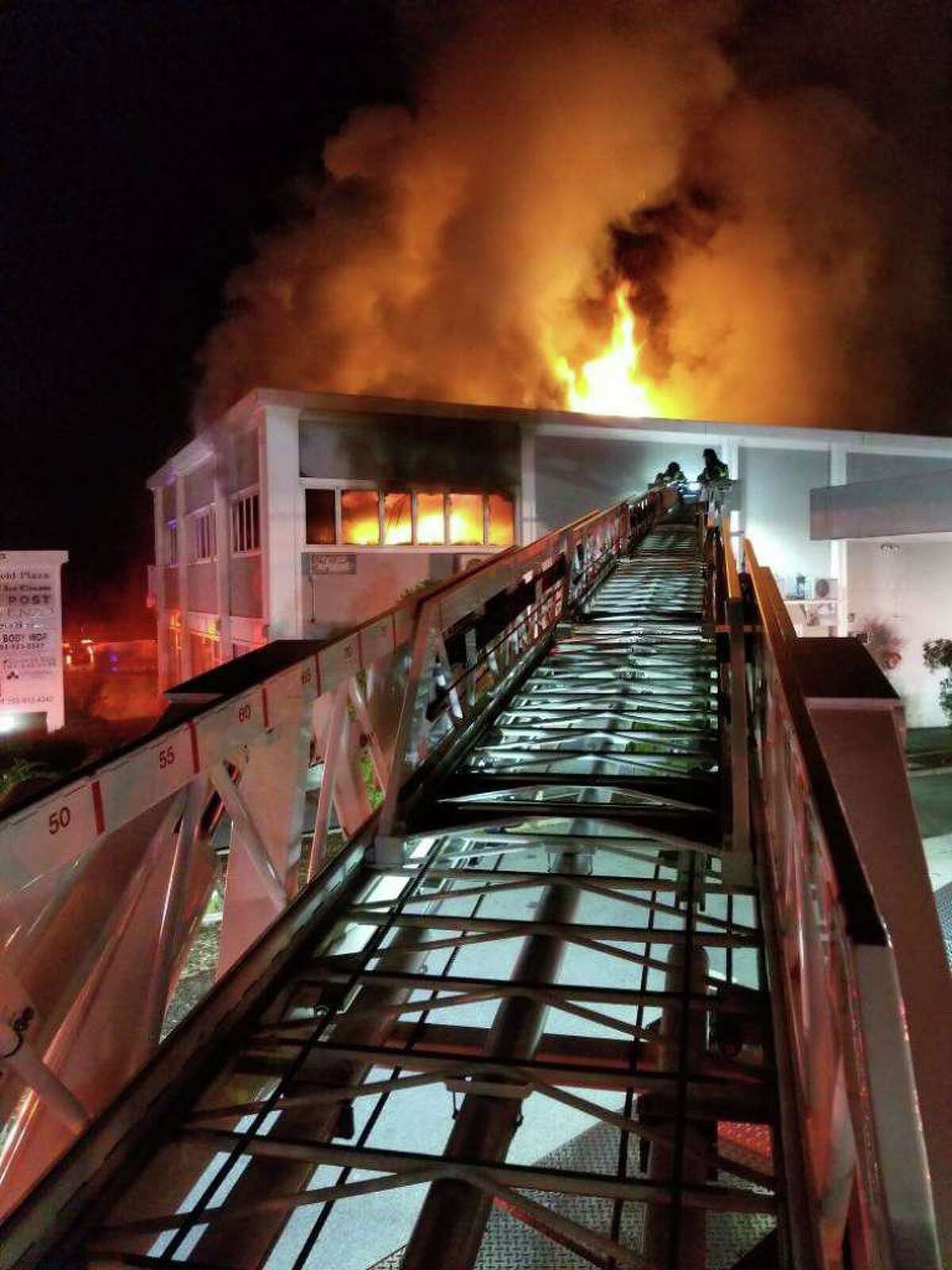 A fire heavily damaged a two-story commercial building at Indian Field Plaza on East Putnam Avenue late Monday night on Oct. 21, 2019. The fire broke out around 11 p.m. at the plaza in Cos Cob.