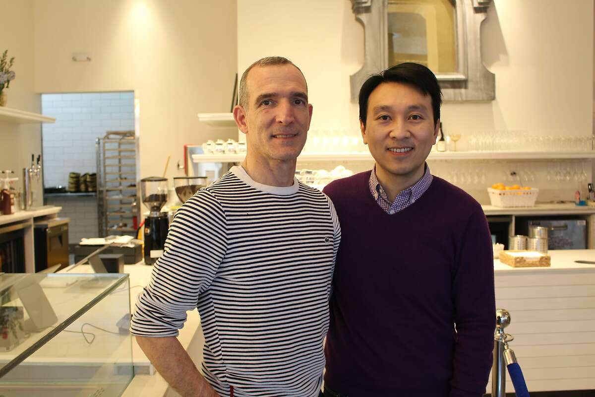 Husbands Danel (left) and David de Betelu stand in their new French tea salon, Maison Danel in San Francisco.